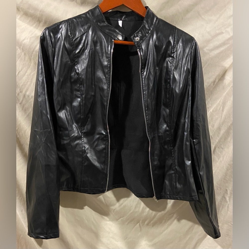 Black, faux leather jacket never been worn